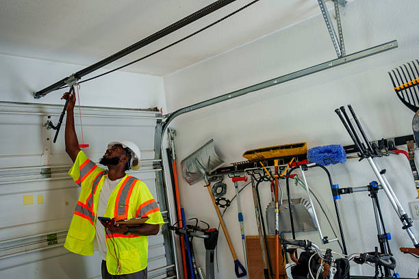 Professional Garage Door Panel Replacement technician working in Shields, MI